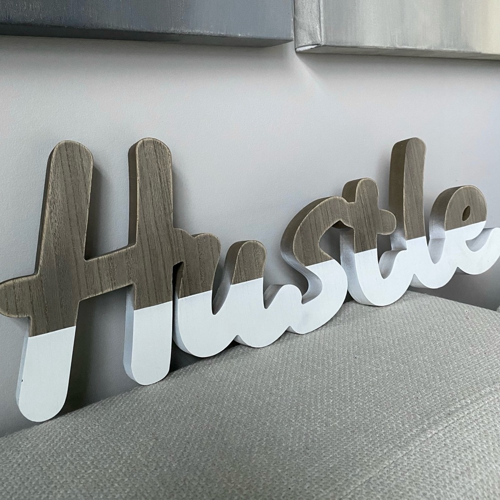 Modern 24” Long Wooden 'Hustle' Wall Decor - Brown and White